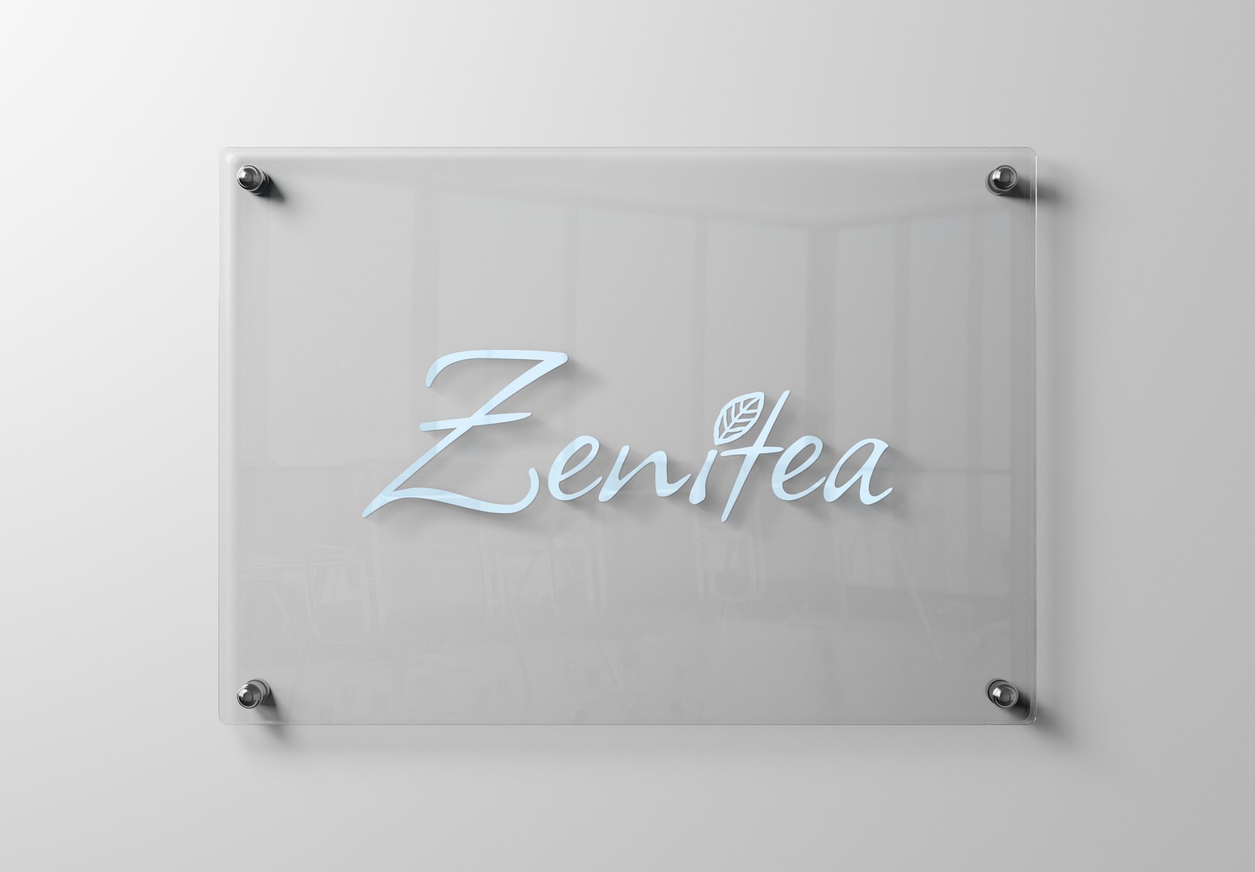 Logo Zenitea sur enseigne en verre, typographie manuscrite et feuille de thé